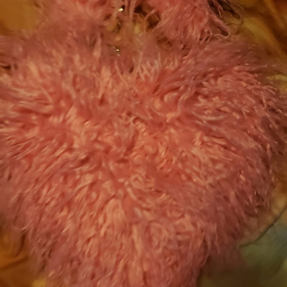 small faux fur heart purse from Dolls Kill.
